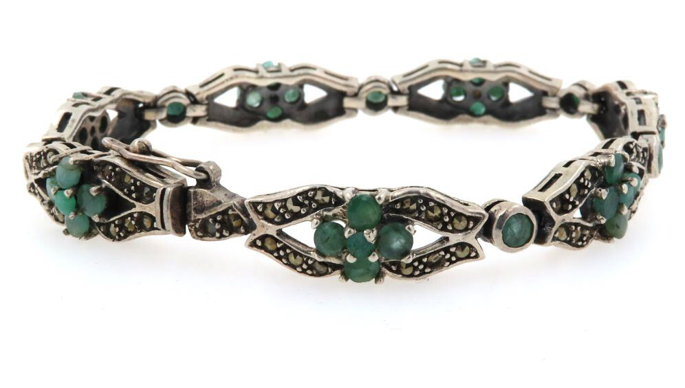 The matching silver bracelet set with chrysoprase and marcasite in an organic Art Nouveau design